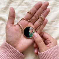 Thumbnail for Thumb warming the rose gold octagon bracelet plate: the hidden photo appears under the thumb while the rest stays black | SKU: TPH-OCTB-ROSEGOLD-18