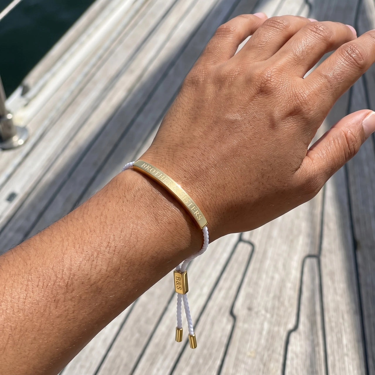 Braided bracelet — worn, real size, gold | SKU: laperle-g