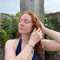 Thumbnail for Black string bracelet — worn in the shower, waterproof, silver | SKU: lecaviar-wg