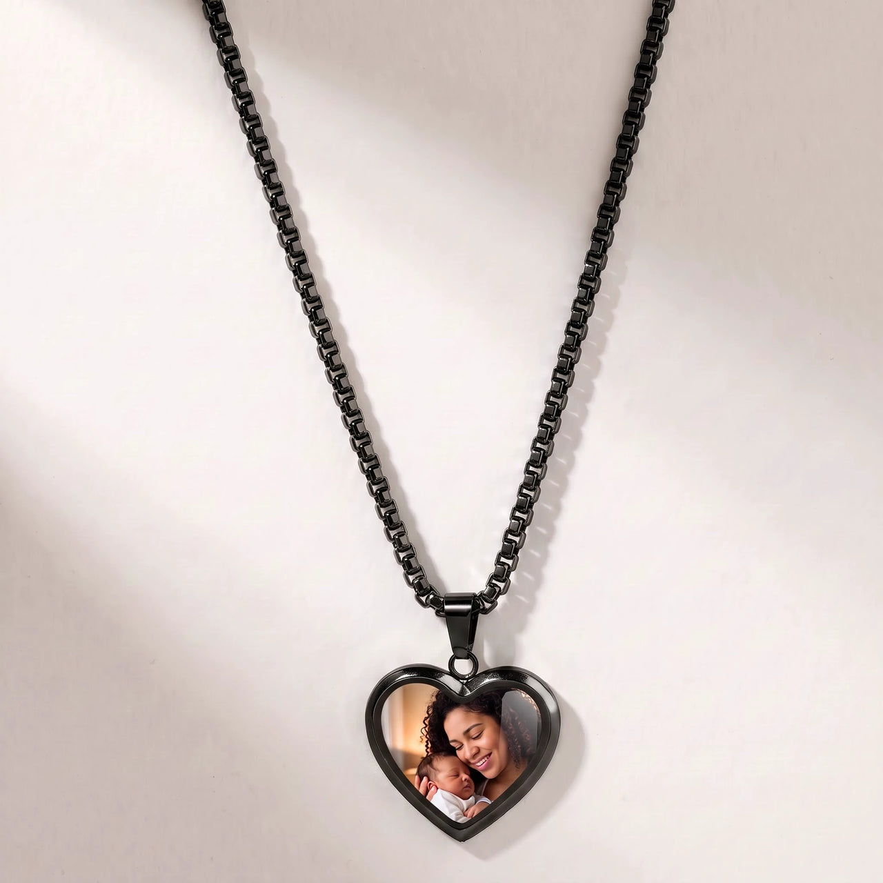 Secret Classic Heart Photo Necklace in black, heart pendant on a box chain showing the hidden photo | SKU: TPH-CHTN-BLACK-SMALL