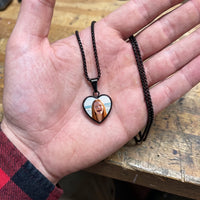 Thumbnail for The black heart photo pendant in an open palm, showing its real small size | SKU: TPH-CHTN-BLACK-SMALL