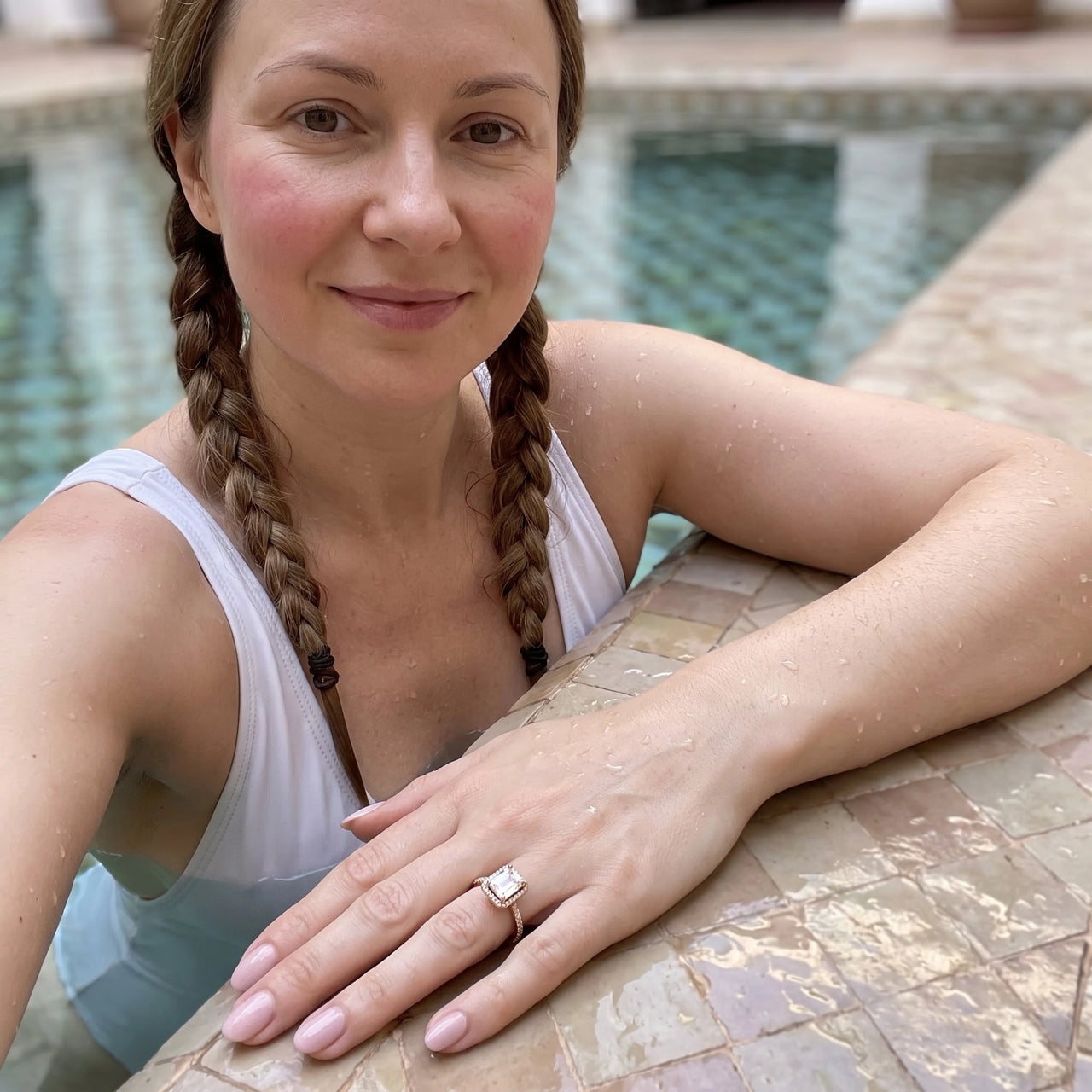 Emerald cut ring — worn by the water, rose gold | SKU: 1969566-4-5-rose-gold